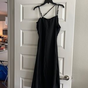 Black evening dress with asymmetric back straps